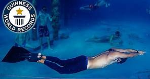 Longest distance swam underwater holding breath - Guinness World Records