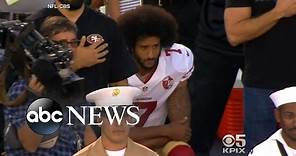 Colin Kaepernick Takes a Knee for National Anthem