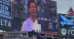 Justin Guarini singing the national anthem at the game today.