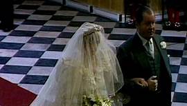 Princess Diana is walked down the aisle by her father John Spencer