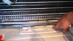 How to fix a leaking refrigerator - frozen defrost drain tube