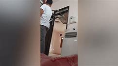 Tenant attaches split-type aircon on his room's door