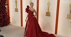 Cara Delevingne Makes Her Oscars Red Carpet Debut in a Daring Gown with a Thigh-High Slit
