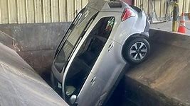 Car gets stuck in trash compactor at Southboro DPW