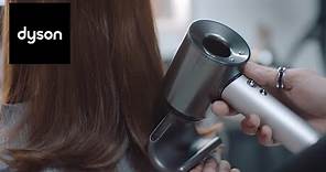 Using the attachments on the Dyson Supersonic™ professional hair dryer