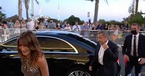 Nicolas Sarkozy and Carla Bruni arriving at Dior Party in Cannes