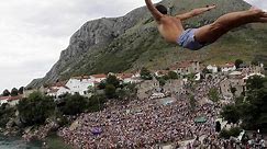 Watch these people jump off a bridge in Bosnia