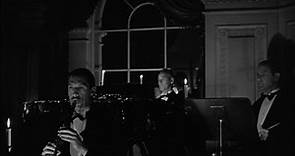 Escena de la película El puente de Waterloo de 1940 interpretada por Vivien Leigh y Robert Taylor, bailando la melodia Auld Lang Syne