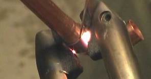 Resistance brazing 3/8 and 1/2" copper tubing, using American Beauty resistance soldering equipment.