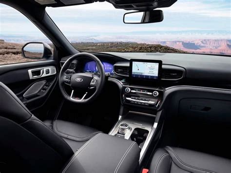 The luxurious and tech-filled interior of a 2021 Ford Explorer ST for sale.