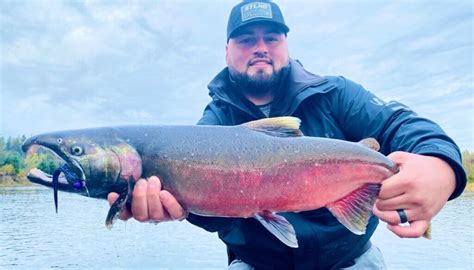 Angler with Coho Salmon