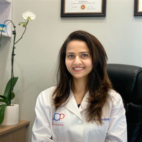 Dr Dhara Patel / Dr Bhavin Patel ' OraCare - Advance dental care and implant centre'