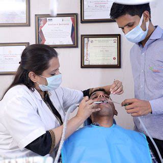 Dr Parveen dental clinic moodbidri near Bus Stop below Menaka Textile