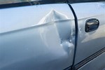 Fixing Dent in Car Door