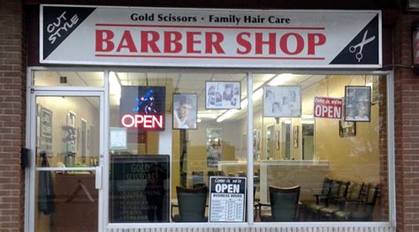 Gold scissor barbers shop