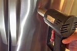 How to Remove Small Dents From Stainless Steel Appliances