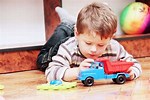 Kids Playing with Toy Trucks
