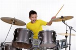 Plues Kid Plays Drums