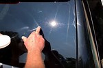 Polishing Scratched Car Windows