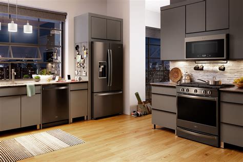 Small Kitchen with Black Stainless Steel Appliances