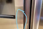 Stainless Steel On Refrigerator Door Is Peeling Off