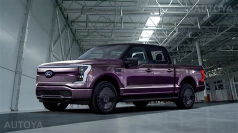Ford F-150 Lightning prototype being charged at a charging station