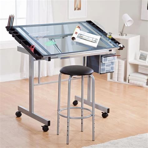 mapmaker working on drafting table